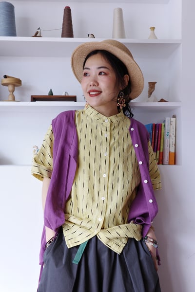 斜扣不對稱下擺抽鬚開襟背心4