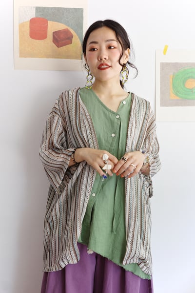 斜扣不對稱下擺抽鬚開襟背心15