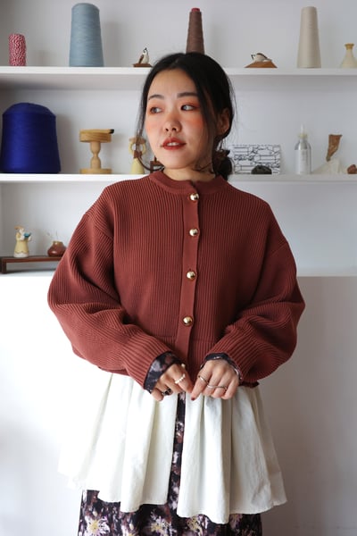 𓏭拼接下擺澎袖針織外罩上衣4