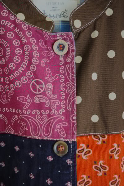 𓏭變形蟲圖騰花布拼接背心18