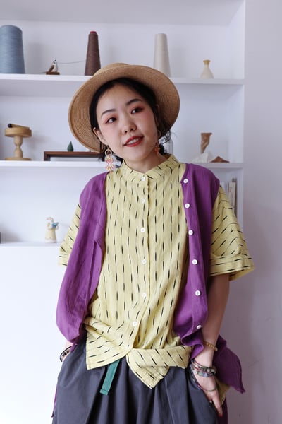 斜扣不對稱下擺抽鬚開襟背心7