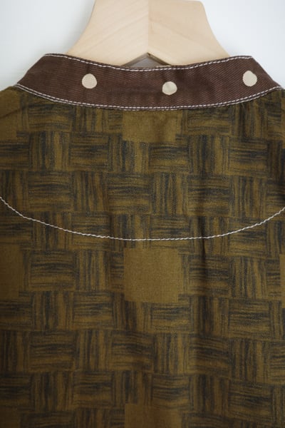 𓏭變形蟲圖騰花布拼接背心21