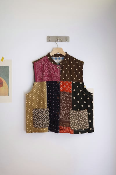 𓏭變形蟲圖騰花布拼接背心1