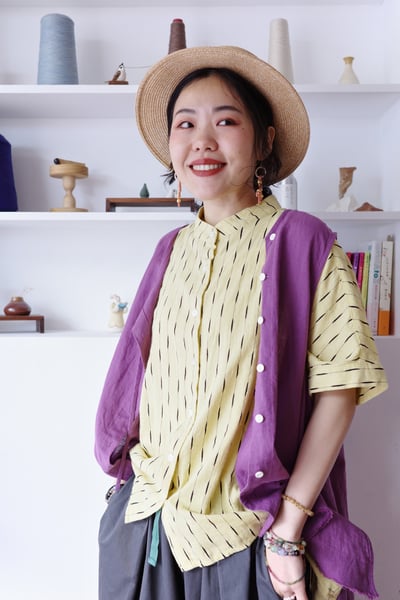 斜扣不對稱下擺抽鬚開襟背心10