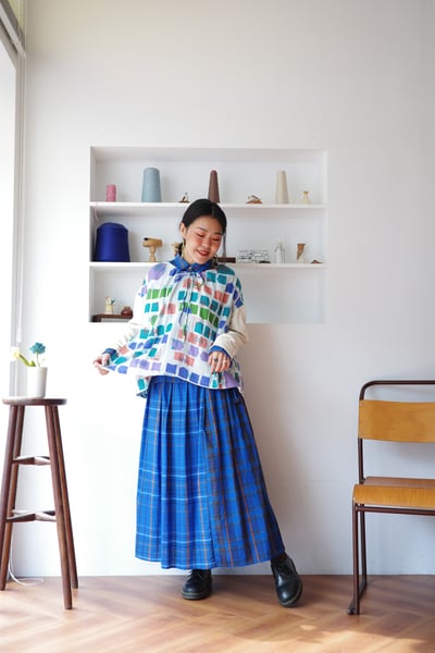 𓏭跳色格紋壓摺半身裙6