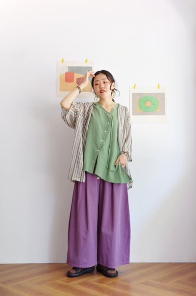 斜扣不對稱下擺抽鬚開襟背心3