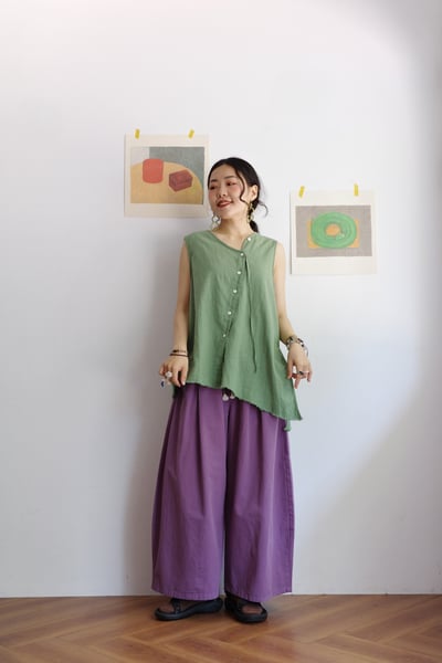 斜扣不對稱下擺抽鬚開襟背心6