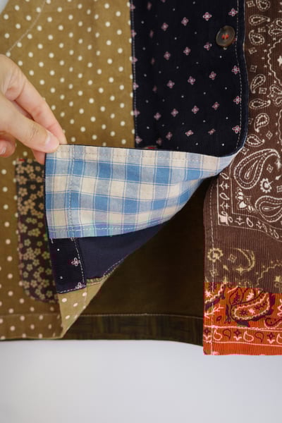 𓏭變形蟲圖騰花布拼接背心19