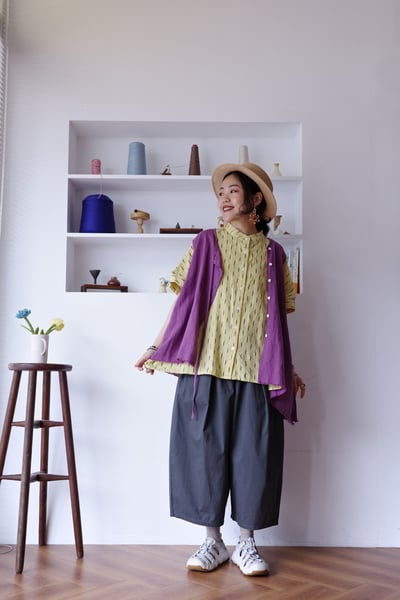 斜扣不對稱下擺抽鬚開襟背心5