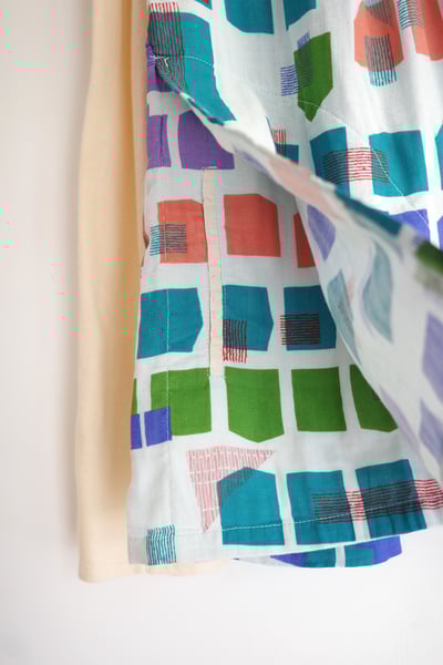 𓏭幾何色塊拼接設計上衣17