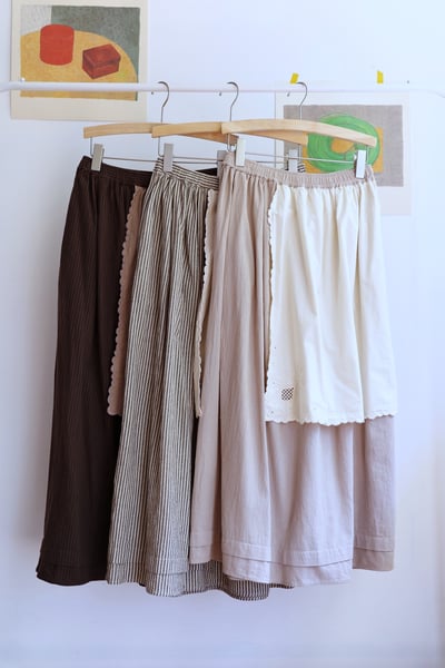 𓏭波浪花邊刺繡小布巾拼接半身裙1