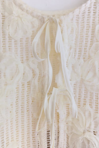 𓏭纏繞花朵洞洞繫帶背心23