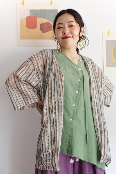 斜扣不對稱下擺抽鬚開襟背心17