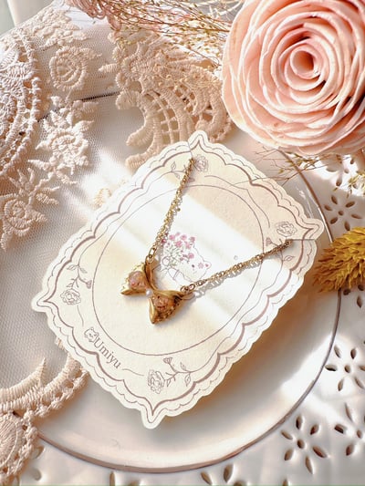 《乾花蝴蝶結不鏽鋼項鍊》1