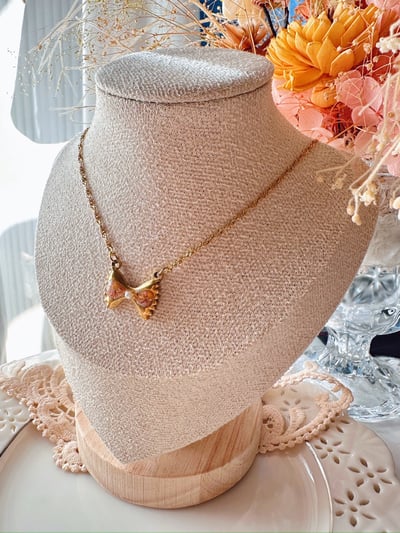 《乾花蝴蝶結不鏽鋼項鍊》2