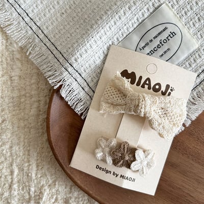 米白系蕾絲蝴蝶結髮夾10