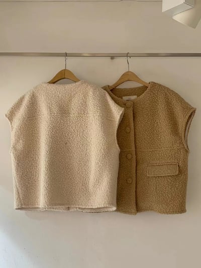 QQ毛背心 eq116510