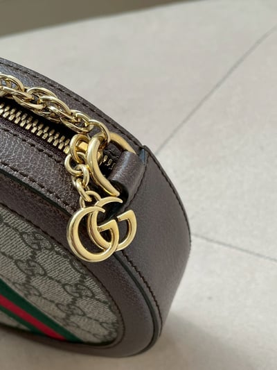 Gucci老花圓餅包9