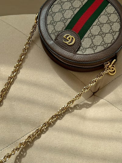 Gucci老花圓餅包12