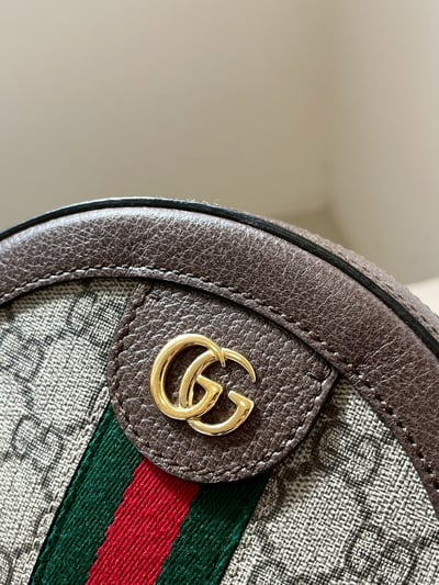 Gucci老花圓餅包7
