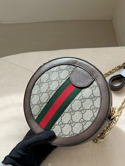 Gucci老花圓餅包6