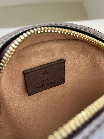 Gucci老花圓餅包11