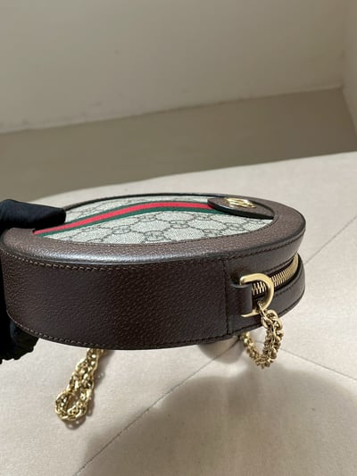 Gucci老花圓餅包8