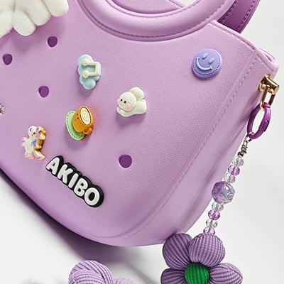 【買1送1】AKIBO滿月包-薰衣紫/珠光雪羽背帶 (肩背手提洞洞包。中性款、輕量、防水) / 內附AKIBO品牌鞋扣1個。現在買再送鞋扣組(不挑款)4
