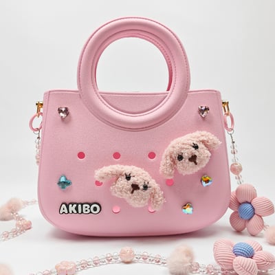 【買1送1】AKIBO滿月包-櫻花粉/珠光雪羽背帶(肩背手提洞洞包。中性款、輕量、防水) / 內附AKIBO品牌鞋扣1個。現在買再送鞋扣組(不挑款)2