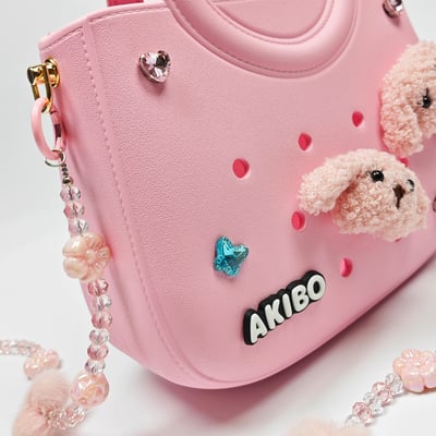 【買1送1】AKIBO滿月包-櫻花粉/珠光雪羽背帶(肩背手提洞洞包。中性款、輕量、防水) / 內附AKIBO品牌鞋扣1個。現在買再送鞋扣組(不挑款)4