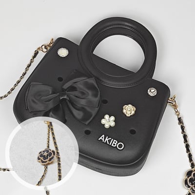 【買1送1】AKIBO滿月包-經典黑/皮革花漾背帶(肩背手提洞洞包。中性款、輕量、防水) / 內附AKIBO品牌鞋扣1個。現在買再送鞋扣組(不挑款)1