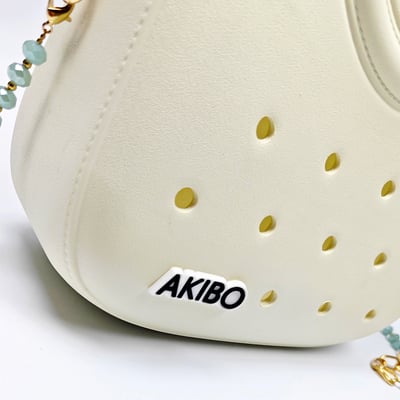 【買1送1】AKIBO滿月包-牛奶白/手工編織花朵背帶(肩背手提洞洞包。中性款、輕量、防水) / 內附AKIBO品牌鞋扣1個。現在買再送鞋扣組(不挑款)9