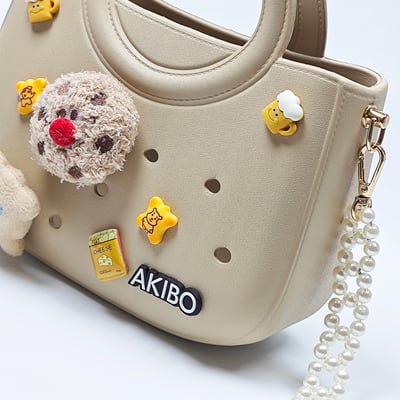【買1送1】AKIBO滿月包-奶油白/星光珠環背帶(肩背手提洞洞包。中性款、輕量、防水) / 內附AKIBO品牌鞋扣1個。現在買再送鞋扣組(不挑款)4