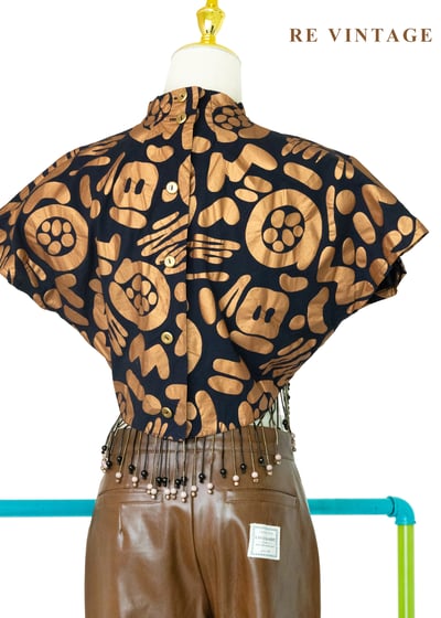 爵士年代的金色雨絲造型上衣10