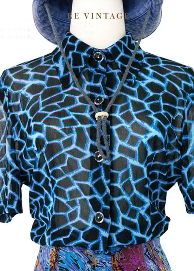 視覺靈魂長頸鹿紋透膚上衣3