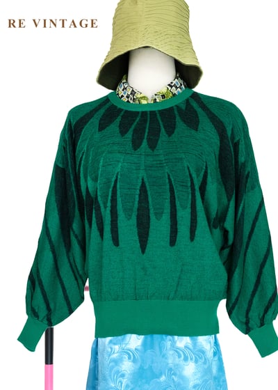 翠綠森林裡孔雀展翅針織毛衣1