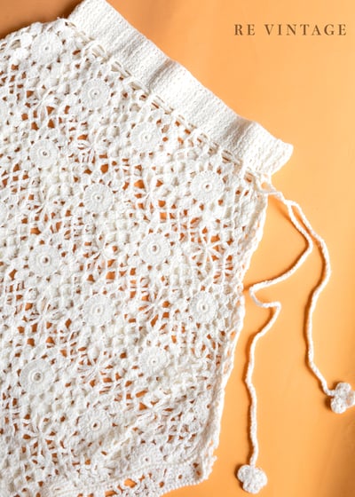 Pure white 針織小花荷葉領罩衫13