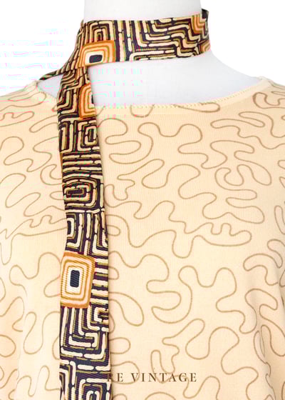 Tender Peach 線條繞繞薄款針織上衣3