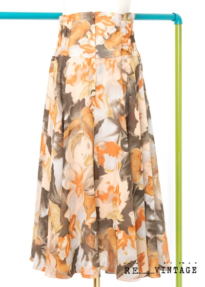 橘子色抽象花朵中長裙5