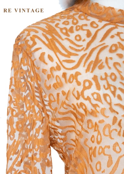 橘子色野性豹紋透膚上衣5