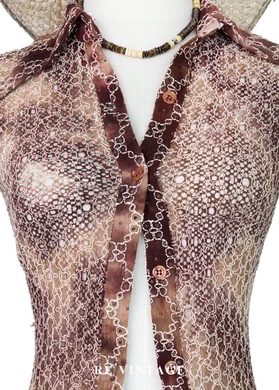 可可荒野夢幻簍空蕾絲上衣3