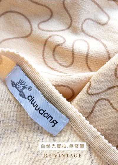 Tender Peach 線條繞繞薄款針織上衣11