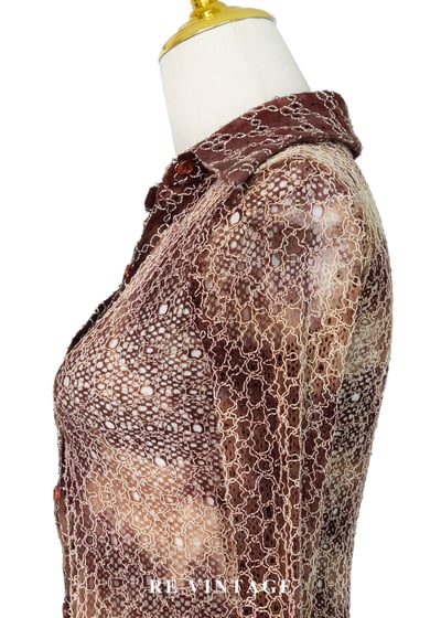 可可荒野夢幻簍空蕾絲上衣6