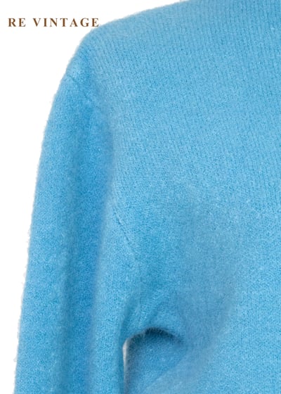 彩色小行星環繞冷色宇宙毛衣4