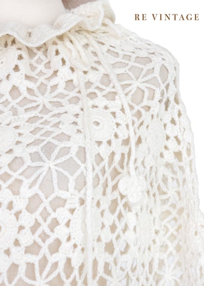 Pure white 針織小花荷葉領罩衫4