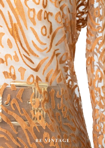 橘子色野性豹紋透膚上衣6