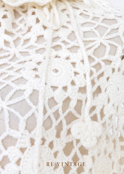 Pure white 針織小花荷葉領罩衫5