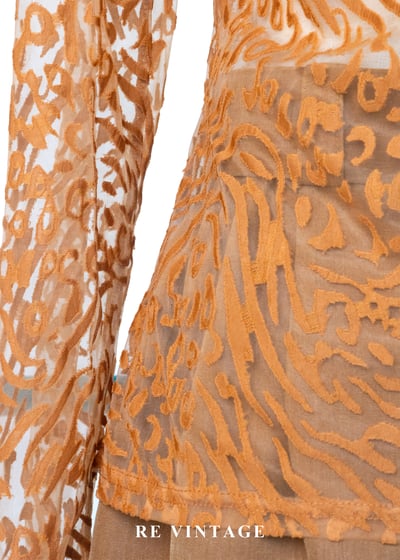 橘子色野性豹紋透膚上衣10