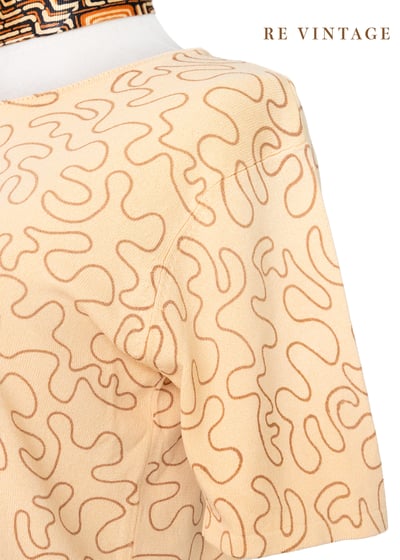 Tender Peach 線條繞繞薄款針織上衣5