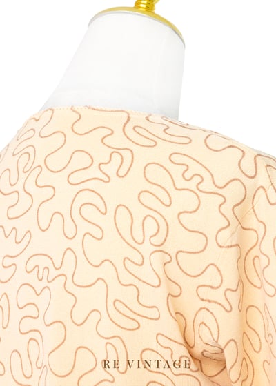 Tender Peach 線條繞繞薄款針織上衣7